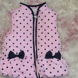 Pink puffy vest